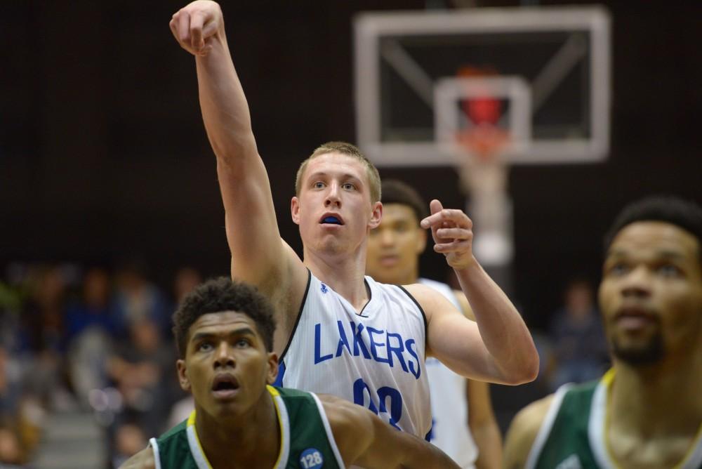 GVL / Luke Holmes - Luke Ryskamp (23) takes the free throw. GVSU men’s basketball defeated Wayne State University on Thursday, Jan.19, 2017.