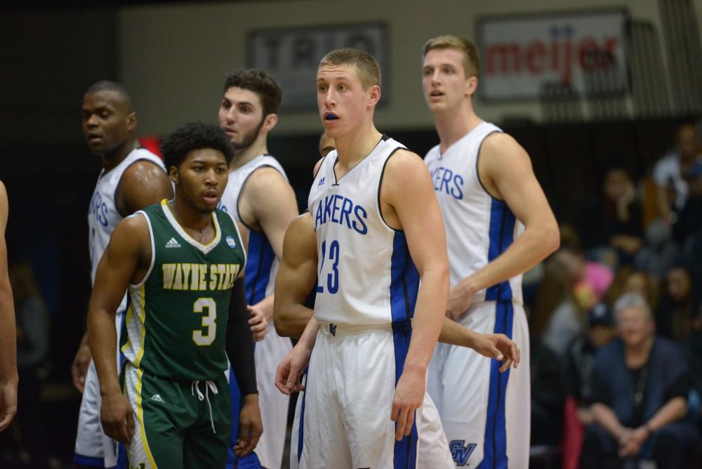 GVL / Luke Holmes - The players look over to the bench. GVSU men’s basketball defeated Wayne State University on Thursday, Jan.19, 2017.