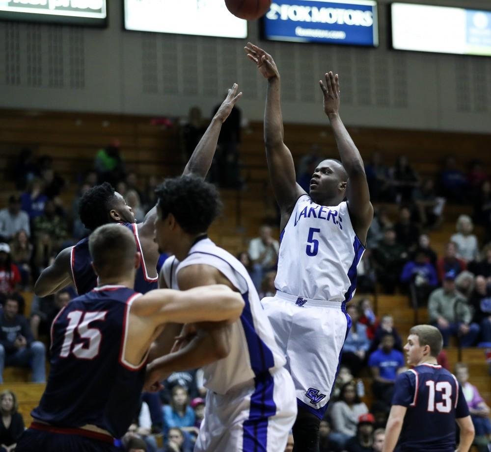 GVL/Kevin Sielaff - Trevin Alexander (5) steps up for a jumper and fades away during the game inside the Fieldhouse Arena as Grand Valley squares off against SVSU on Saturday, Jan. 21, 2017. The Lakers took the victory with a final score of 80-71.