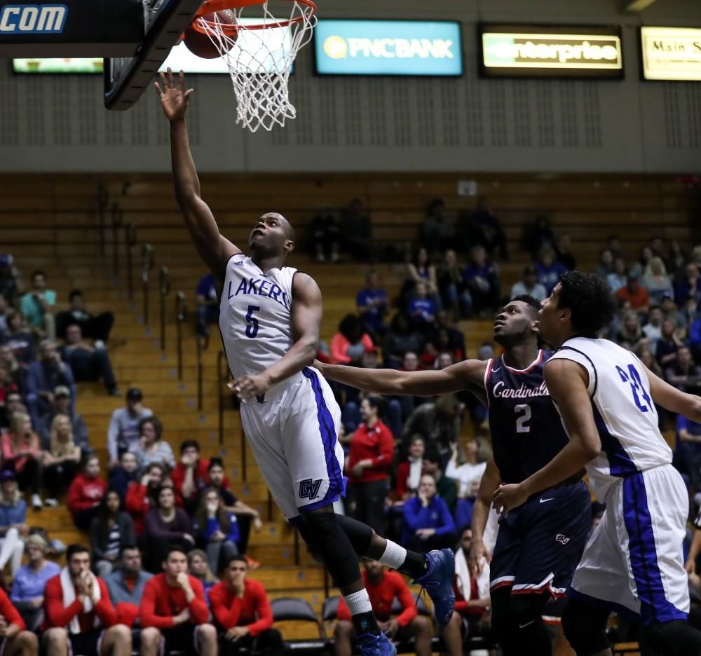 GVL/Kevin Sielaff - Trevin Alexander (5) goes in for a lay-up during the game inside the Fieldhouse Arena as Grand Valley squares off against SVSU on Saturday, Jan. 21, 2017. The Lakers took the victory with a final score of 80-71.