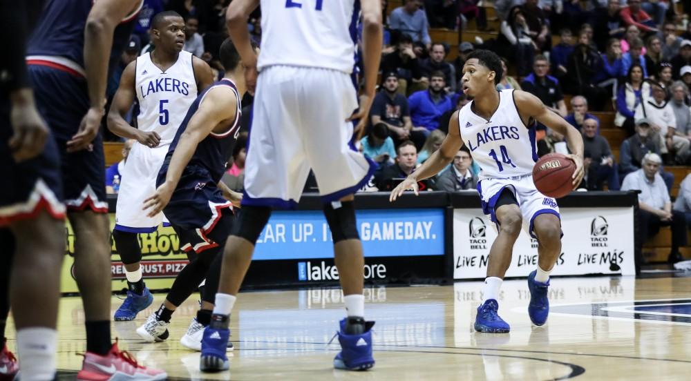 GVL/Kevin Sielaff - Chris Dorsey (14) steps back and looks to pass during the game inside the Fieldhouse Arena as Grand Valley squares off against SVSU on Saturday, Jan. 21, 2017. The Lakers took the victory with a final score of 80-71.