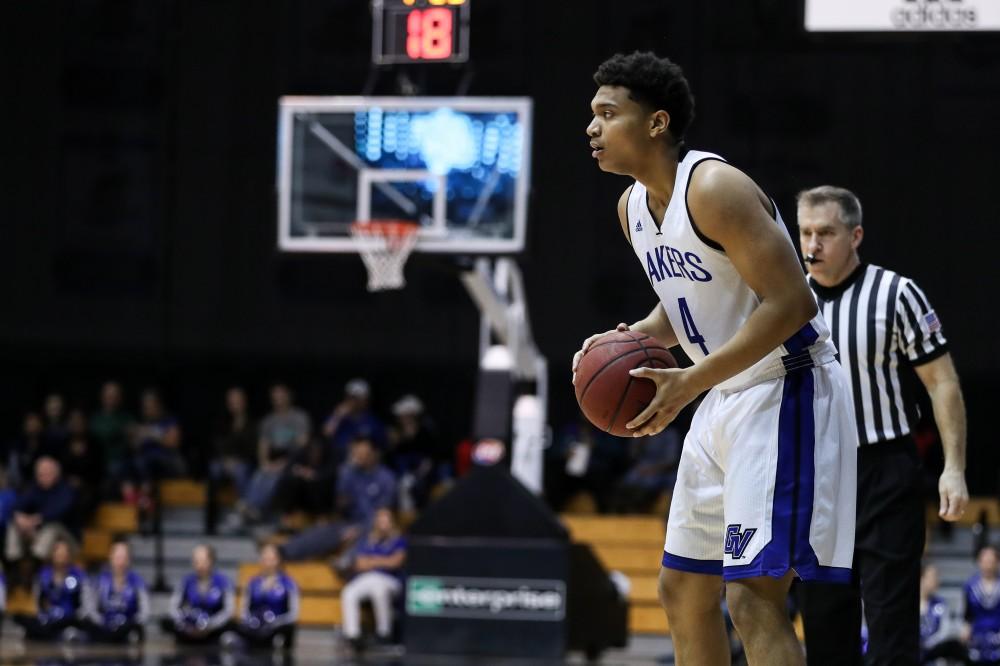 GVL/Kevin Sielaff - Lance Dollison (4) holds the ball and looks for an open passing lane during the game inside the Fieldhouse Arena as Grand Valley squares off against SVSU on Saturday, Jan. 21, 2017. The Lakers took the victory with a final score of 80-71.