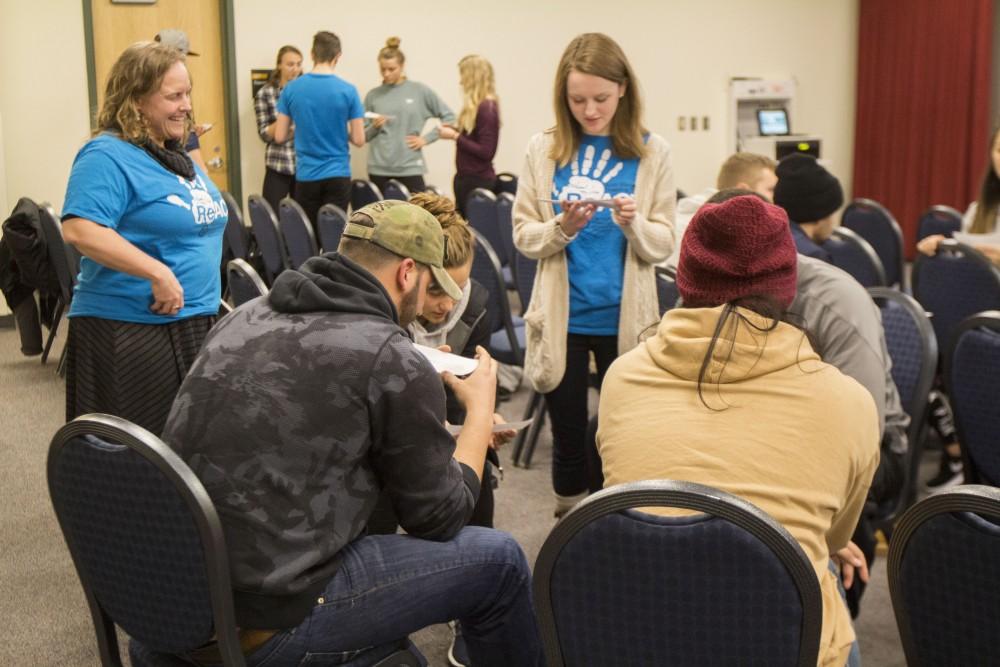 GVL/Mackenzie Bush - GVSU students plan a skit at the ReACT! Teach In Thursday, Jan. 19, 2017.