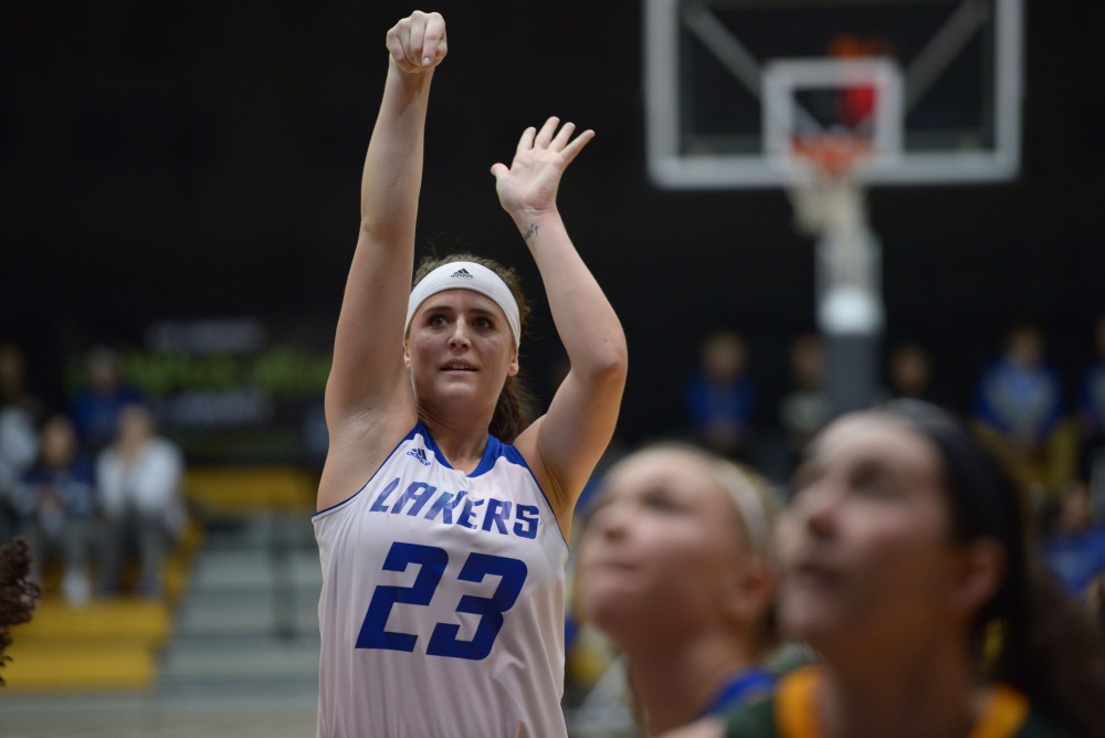 GVL / Luke Holmes - Kayla Dawson (23) shoots the free throw. GVSU Women’s Basketball defeated Wayne State University on Thursday, Jan.19, 2017.