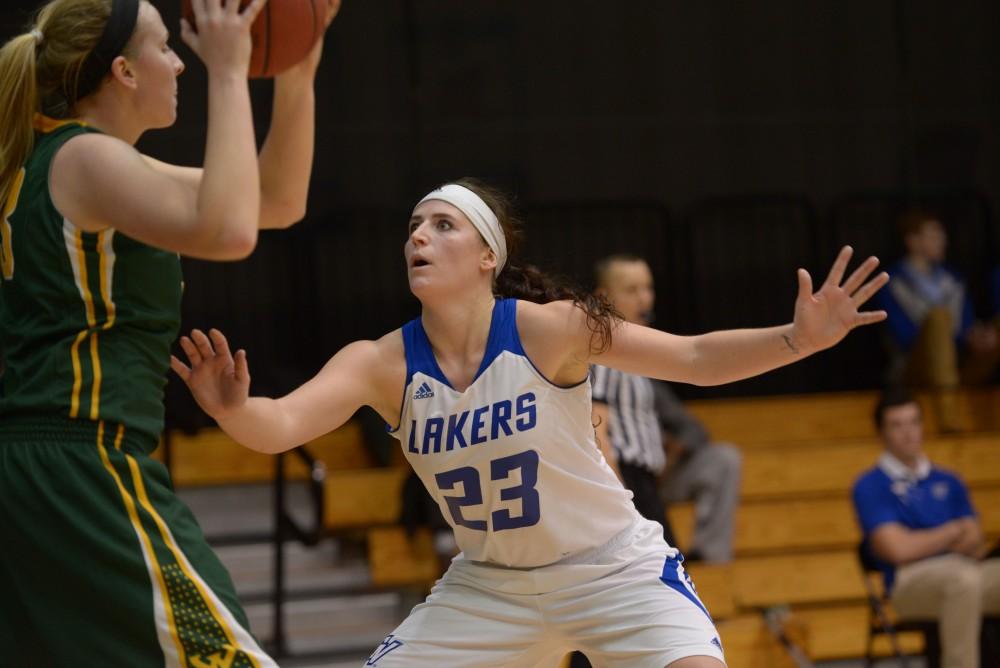 GVL / Luke Holmes - Kayla Dawson (23) plays tight defense. GVSU Women’s Basketball defeated Wayne State University on Thursday, Jan.19, 2017.