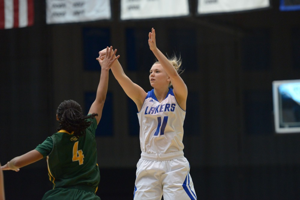 GVL / Luke Holmes - Piper Tucker (11) pops the shot. GVSU Women’s Basketball defeated Wayne State University on Thursday, Jan.19, 2017.