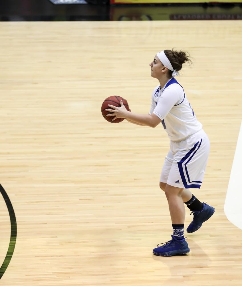 GVL/Kevin Sielaff - Taylor Parmley (14) steps back and tries a three pointer during the game inside the Fieldhouse Arena as Grand Valley squares off against SVSU on Saturday, Jan. 21, 2017. The Lakers took the victory with a final score of 63-57.