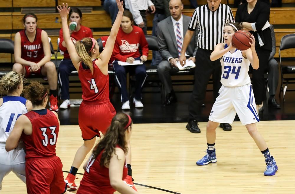 GVL/Kevin Sielaff - Bailey Cairnduff (34) holds the ball at the top of the arc and looks to pass during the game inside the Fieldhouse Arena as Grand Valley squares off against SVSU on Saturday, Jan. 21, 2017. The Lakers took the victory with a final score of 63-57.