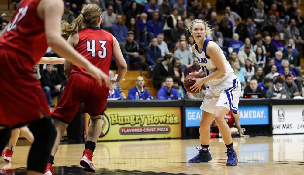 GVL/Kevin Sielaff - Piper Tucker (11) receives the ball, waits, and looks to pass during the game inside the Fieldhouse Arena as Grand Valley squares off against SVSU on Saturday, Jan. 21, 2017. The Lakers took the victory with a final score of 63-57.