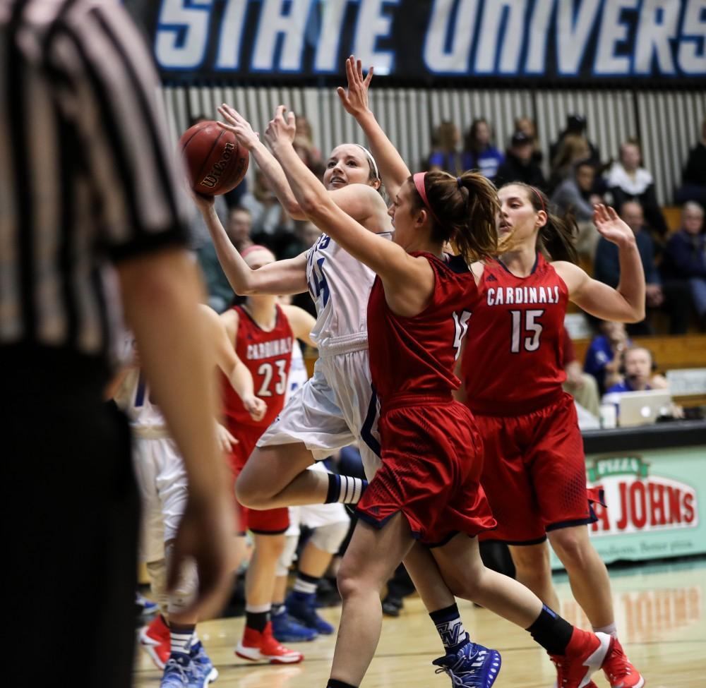 GVL/Kevin Sielaff - Bailey Cairnduff (34) goes up for a lay-up but is fouled during the game inside the Fieldhouse Arena as Grand Valley squares off against SVSU on Saturday, Jan. 21, 2017. The Lakers took the victory with a final score of 63-57.