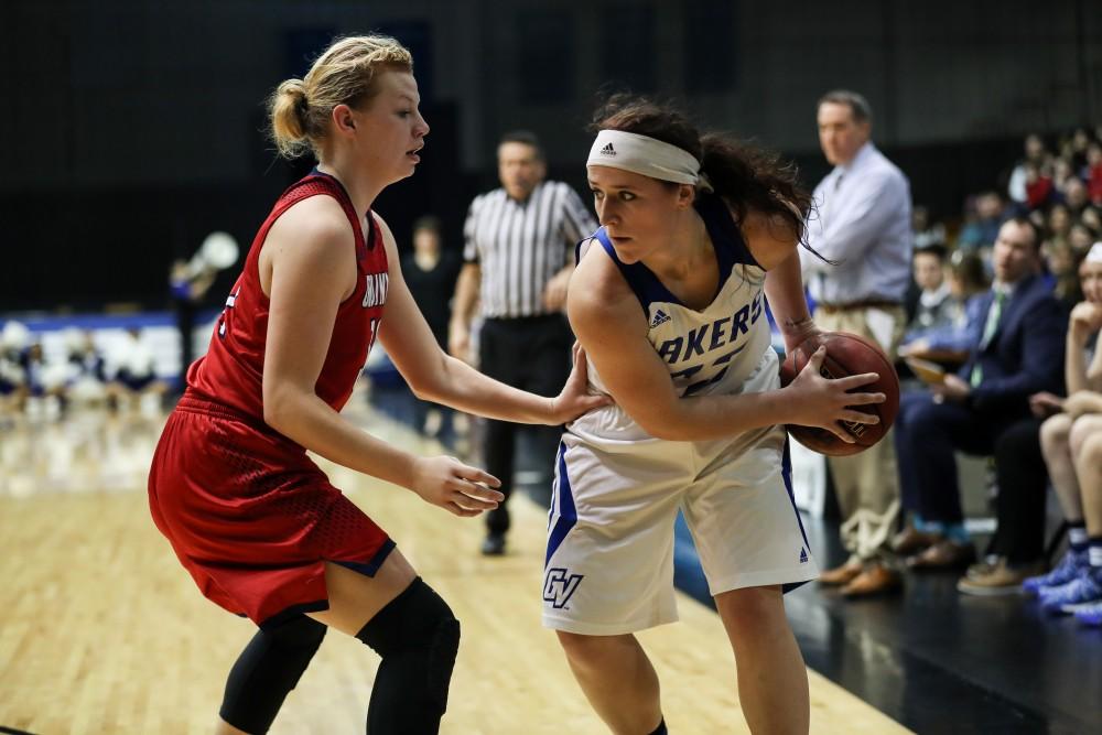 GVL/Kevin Sielaff - Kayla Dawson (23), defended closely, looks to make space during the game inside the Fieldhouse Arena as Grand Valley squares off against SVSU on Saturday, Jan. 21, 2017. The Lakers took the victory with a final score of 63-57.