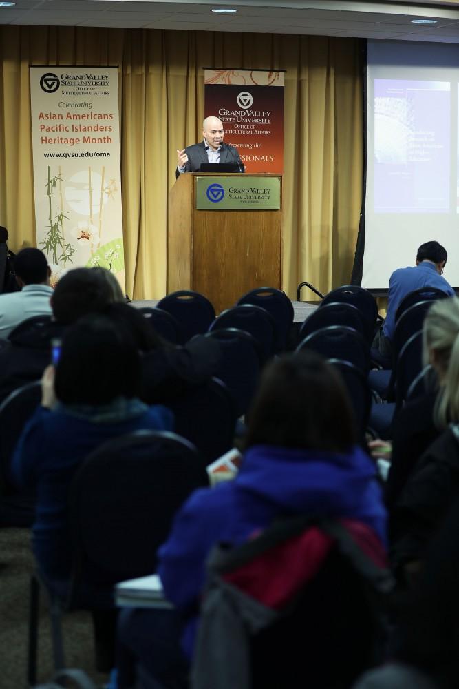 GVL/Kevin Sielaff - Samuel D. Museus, Associate Professor of Higher Education and Student Affairs at Indiana University Bloomington, speaks inside Kirkhof's Grand River Room on Wednesday, Feb. 8, 2017. 