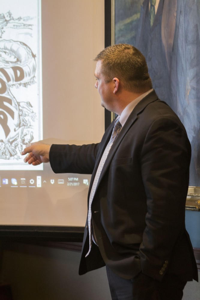 GVL/Mackenzie Bush -Adam London, Health Officer for Kent County, speaks in the University Club Tuesday, Feb. 21, 2017. 