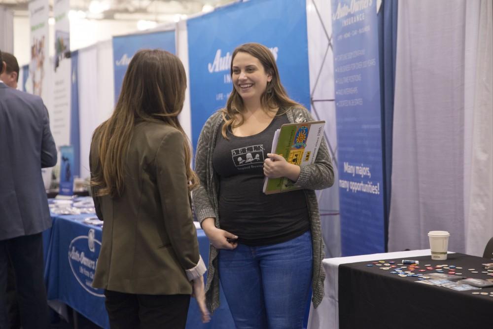 GVL / Luke Holmes - A student talks to a representative for Bell’s Brewing Co.The Career Fair was held in the DeVos Place on Thursday, Feb. 23, 2016.