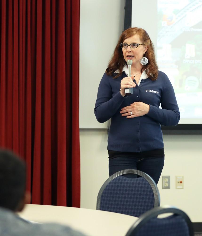 GVL/Kevin Sielaff - Melissa Baker-Boosamra introduces keynote speaker Professor Louis Moore during the Democracy: 101 event on Wednesday, Feb. 22, 2017. 