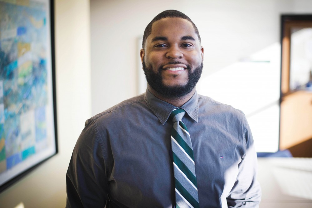 GVL / Luke Holmes - Professor Donald Mitchell poses in the DeVos building at the downtown Pew Campus.