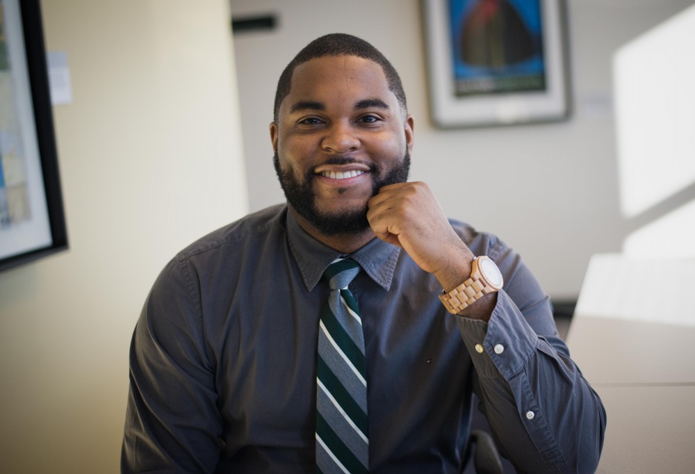 GVL / Luke Holmes - Professor Donald Mitchell poses in the DeVos building at the downtown Pew Campus.