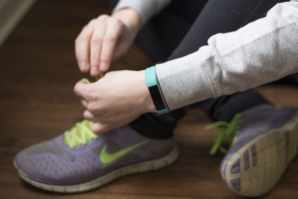 GVL / Luke Holmes - Natalie Longroy gets ready for her workout with her Fitbit.