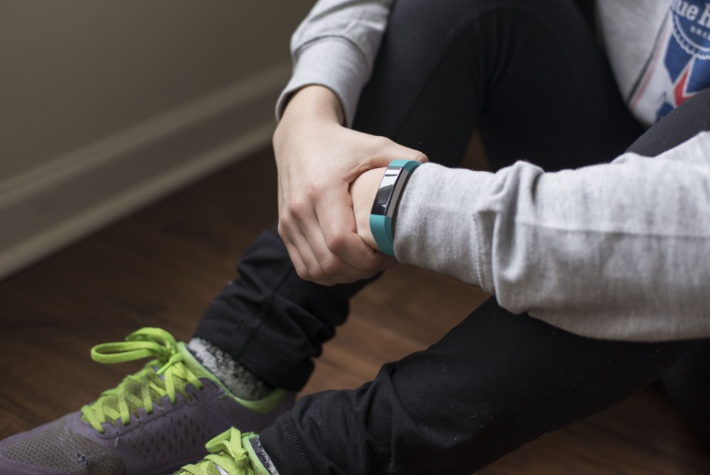 GVL / Luke Holmes - Natalie Longroy gets ready for her workout with her Fitbit.