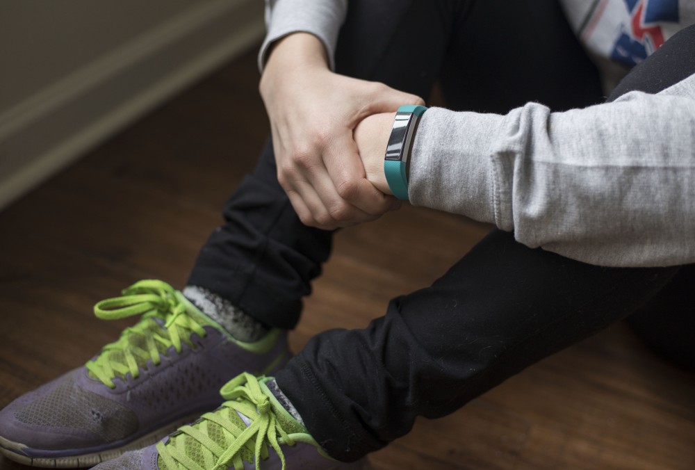 GVL / Luke Holmes - Natalie Longroy gets ready for her workout with her Fitbit.