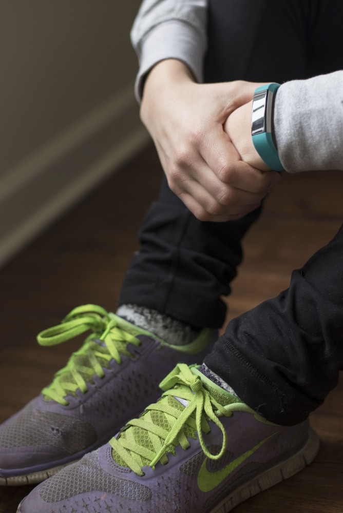 GVL / Luke Holmes - Natalie Longroy gets ready for her workout with her Fitbit.