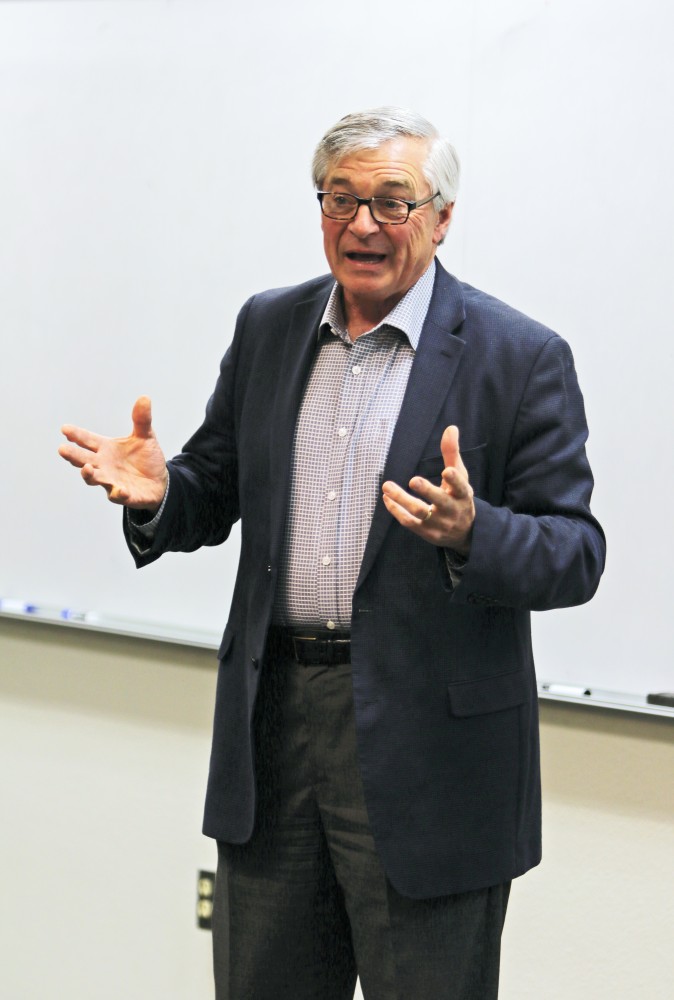 GVL/Hannah Zajac - George Heartwell, a member of President Obama's Climate Change Adaptation Task Force and of the American Bar Association Task Force on Sustainable Developement, gives a presentation on adapting to climate change to a group of GV students on Tuesday, Feb. 21, 2017.​