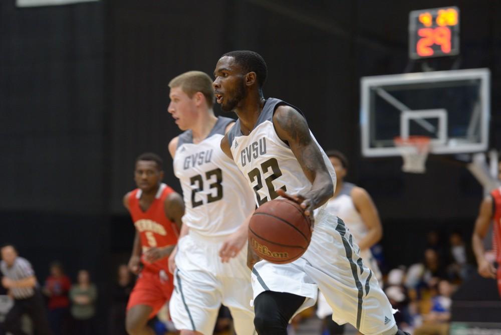 GVL / Luke Holmes - Justin Greason (24) takes up the ball uncontested. GVSU Men’s Basketball defeated Michigan Tech in the Fieldhouse Arena on Thursday, Feb. 16, 2017.