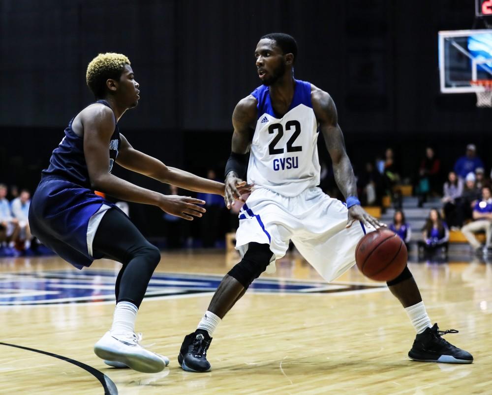 Juwan Starks (22) scans the paint for an outlet pass during the game vs. Northwood inside the Fieldhouse Arena in Allendale on Thursday, Feb. 9, 2017. 