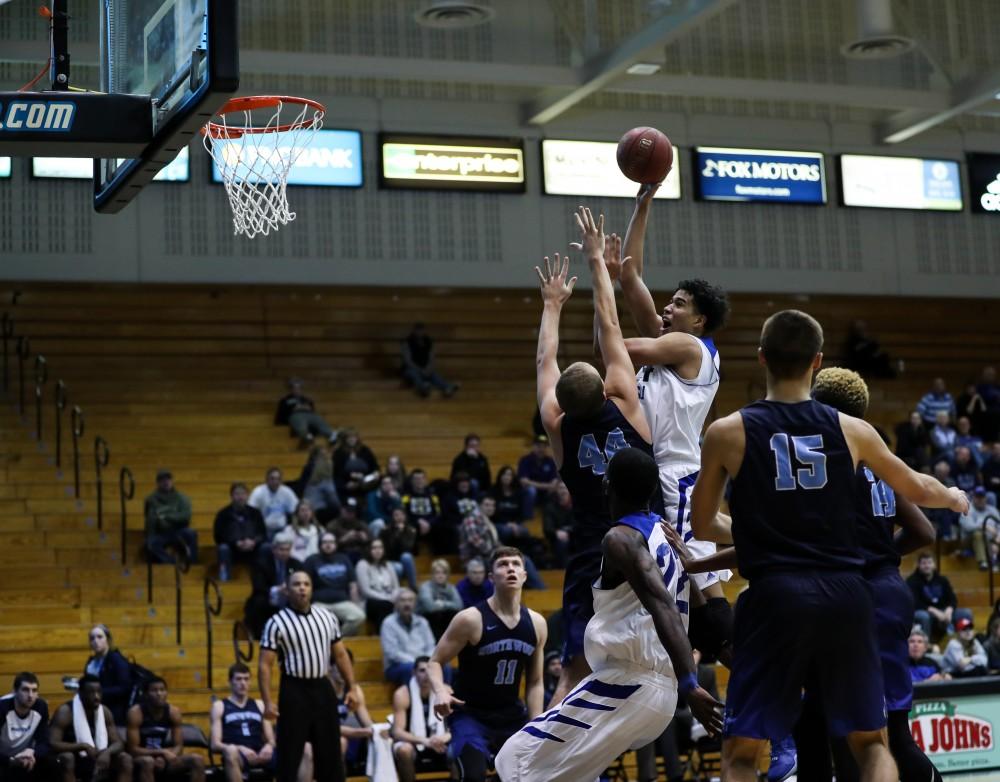 Justin Greason (24) goes up for a shot during the game vs. Northwood inside the Fieldhouse Arena in Allendale on Thursday, Feb. 9, 2017. 