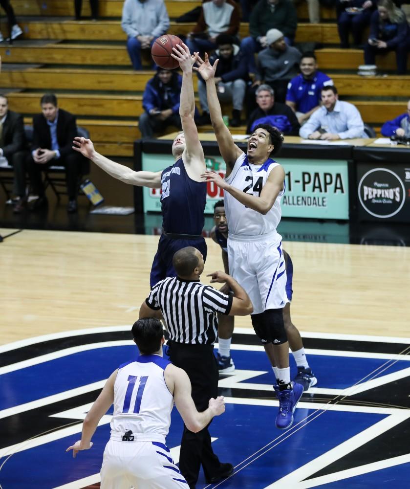 Justin Greason (24) takes the opening tip to start the game during the game vs. Northwood inside the Fieldhouse Arena in Allendale on Thursday, Feb. 9, 2017. 