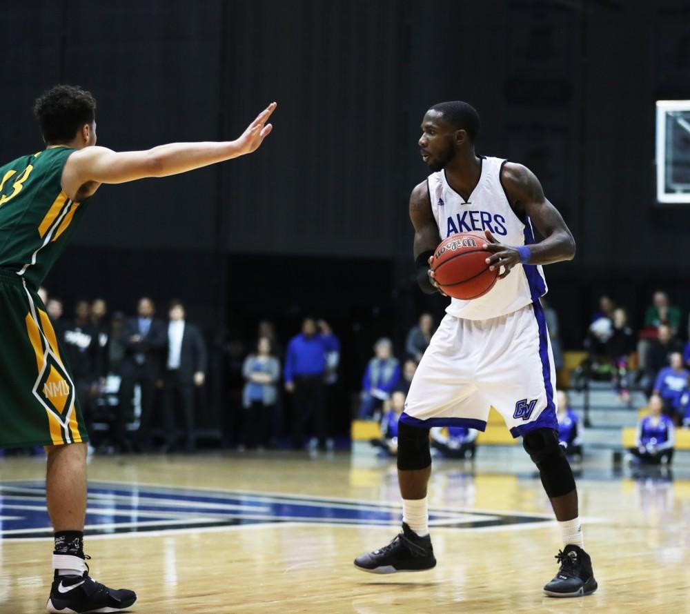 GVL/Kevin Sielaff - Juwan Starks (22) looks to pass the ball during the game against Northern Michigan on Saturday, Feb. 18, 2017 inside the Fieldhouse Arena in Allendale.