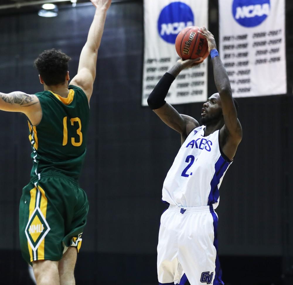 GVL/Kevin Sielaff - Juwan Starks (22) goes up for a shot during the game against Northern Michigan on Saturday, Feb. 18, 2017 inside the Fieldhouse Arena in Allendale.