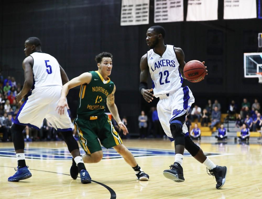 GVL/Kevin Sielaff - Juwan Starks (22) caries the ball into the zone during the game against Northern Michigan on Saturday, Feb. 18, 2017 inside the Fieldhouse Arena in Allendale.