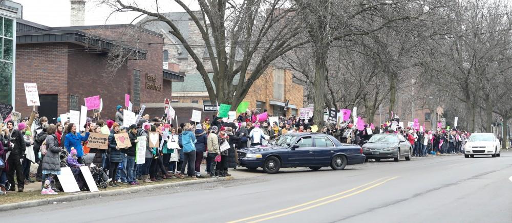 Protesters and supporters gather in front of Planned Parenthood on  425 Cherry St SE in Grand Rapids on Saturday, Feb. 11, 2017. 