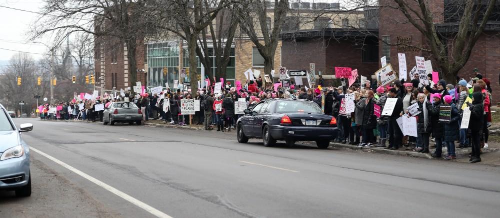 Protesters and supporters gather in front of Planned Parenthood on  425 Cherry St SE in Grand Rapids on Saturday, Feb. 11, 2017. 