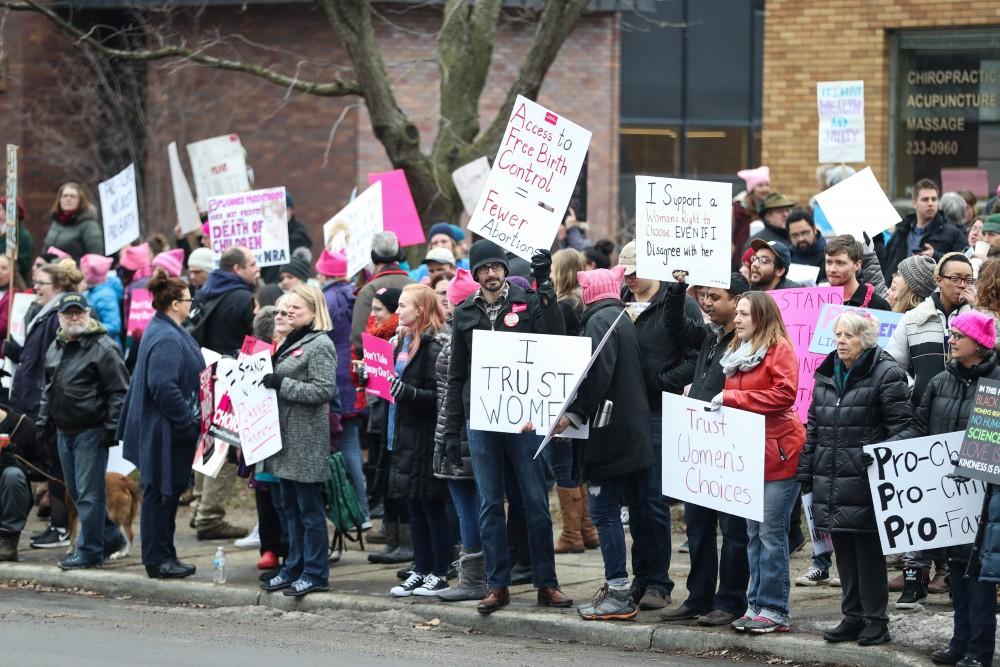 Protesters and supporters gather in front of Planned Parenthood on  425 Cherry St SE in Grand Rapids on Saturday, Feb. 11, 2017. 