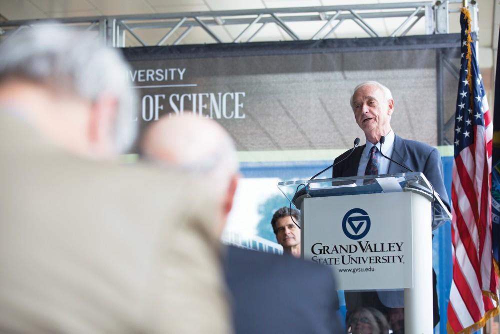 GVL/Kevin Sielaff - Former dean of math and sciences, P. Douglas Kindschi, speaks before the Kindschi Hall of Science. Grand Valley celebrates the P. Douglas Kindschi Hall of Science with a dedication ceremony Friday, August 28th, 2015. The dedication recognized both Grand Valley and state officials that made the realization of this building possible. 