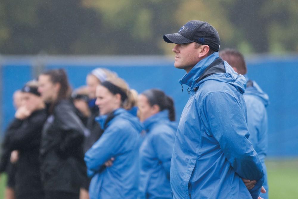 GVL / Luke Holmes - Head Coach, Jeff Hosler, looks on to the play. GVSU Women's Soccer defeats University of Findlay at home Sunday, Oct. 16, 2016. 