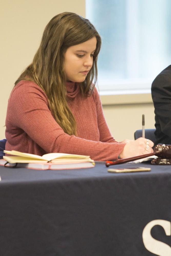 GVL/Mackenzie Bush - Student Senate President, Ella Fritzemeier, takes notes at the Student Senate meeting Thursday, Feb. 23, 2017. 