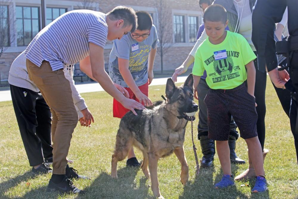 GVL / Emily Frye      
Local kids get the chance to hang out with Officer Karcher's K-9 on Saturday Feb. 18, 2017.