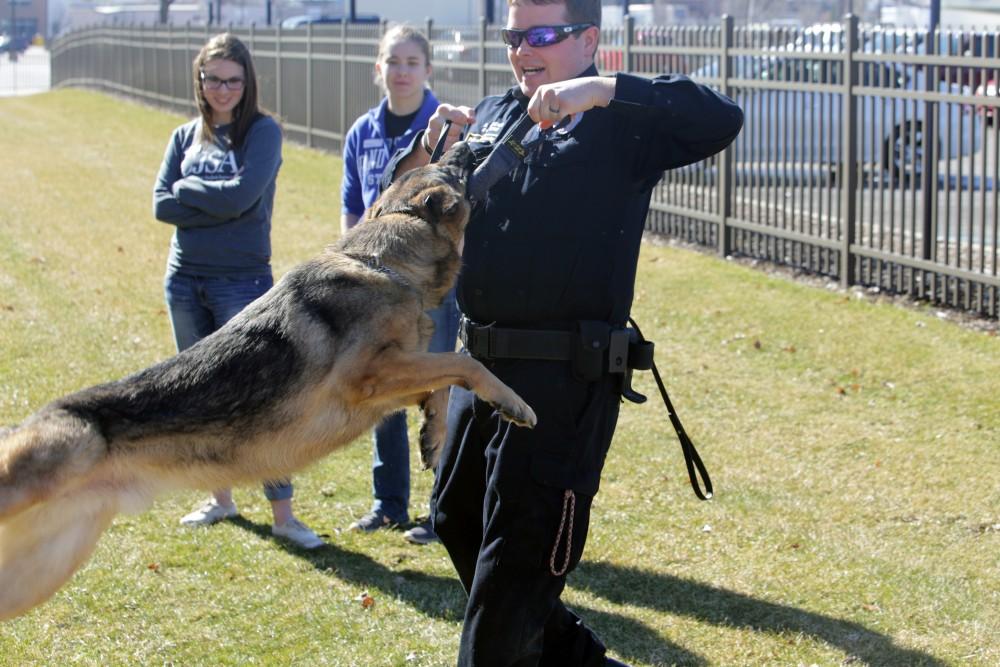 GVL / Emily Frye      
Local kids get the chance to hang out with Officer Karcher's K-9 on Saturday Feb. 18, 2017.