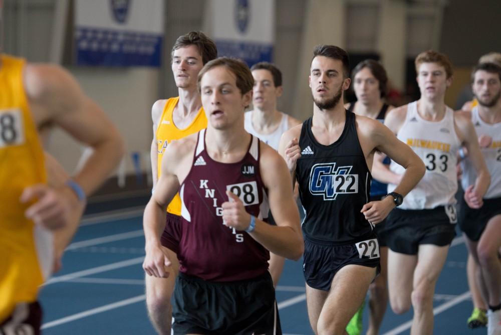 GVL / Luke Holmes - Sam Butler (22) runs down the track. The GVSU Big Meet was held in the Kelly Family Sports Center on Friday, Feb. 10, 2016.