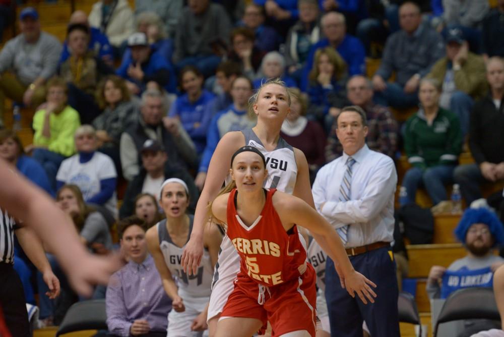 GVL / Luke Holmes - Piper Tucker (11) watches in anticipation as her shot drops. GVSU Women’s Basketball defeated Ferris State University on Monday, Jan. 30, 2016.