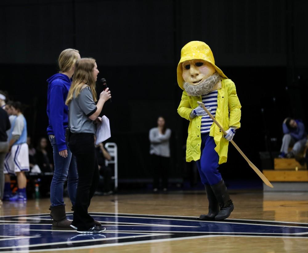 Louis the Laker, in an old costume, dances out on the basketball court during the game vs. Northwood inside the Fieldhouse Arena in Allendale on Thursday, Feb. 9, 2017. 