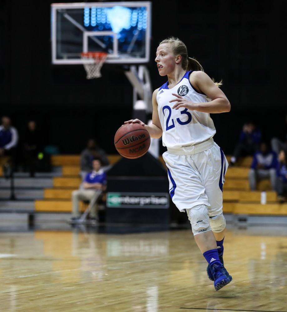 Janae Langs (23) drives the ball up the court during the game vs. Northwood inside the Fieldhouse Arena in Allendale on Thursday, Feb. 9, 2017. 