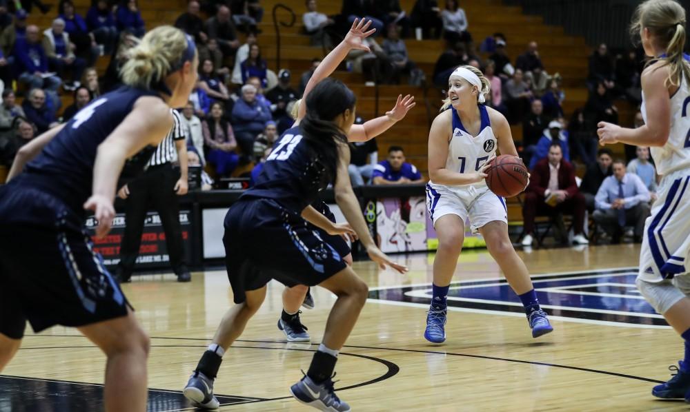 Lindsay Baker (15), under pressure, looks to pass during the game vs. Northwood inside the Fieldhouse Arena in Allendale on Thursday, Feb. 9, 2017. 