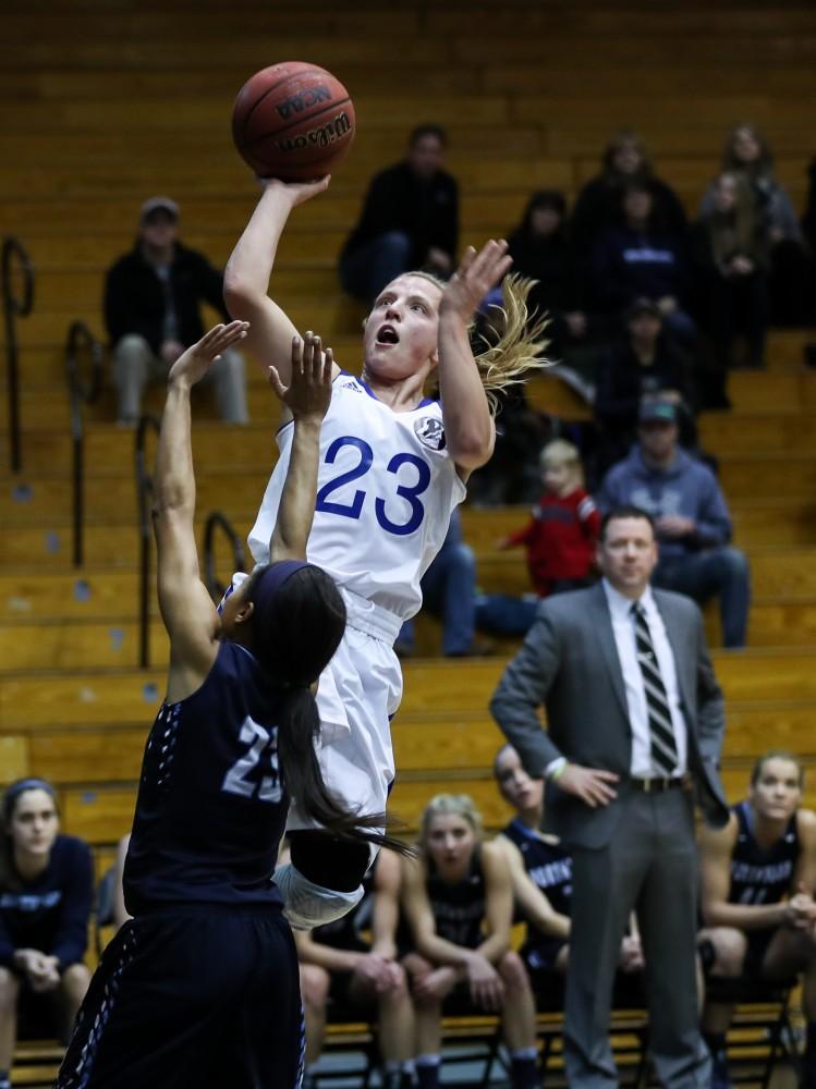 Janae Langs (23) goes up for a shot during the game vs. Northwood inside the Fieldhouse Arena in Allendale on Thursday, Feb. 9, 2017. 