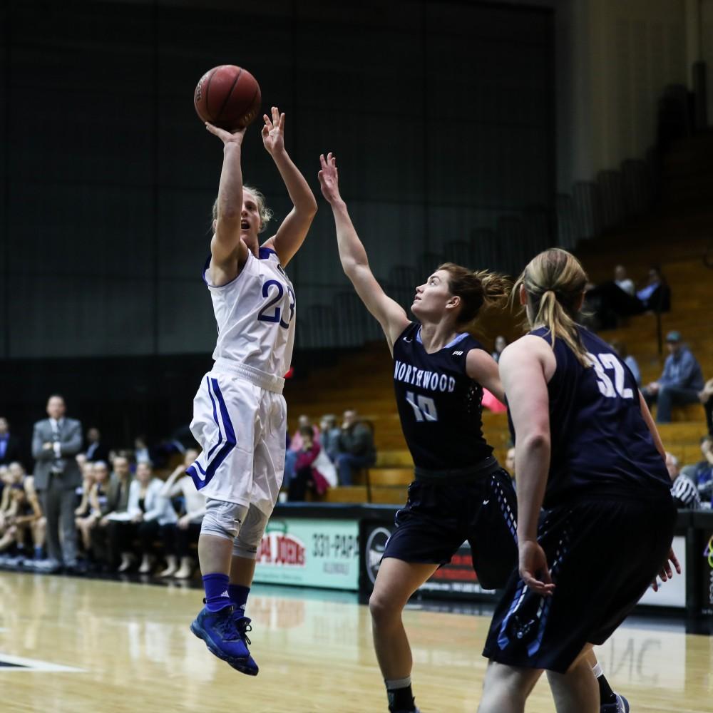 Janae Langs (23) goes up for a shot during the game vs. Northwood inside the Fieldhouse Arena in Allendale on Thursday, Feb. 9, 2017. 