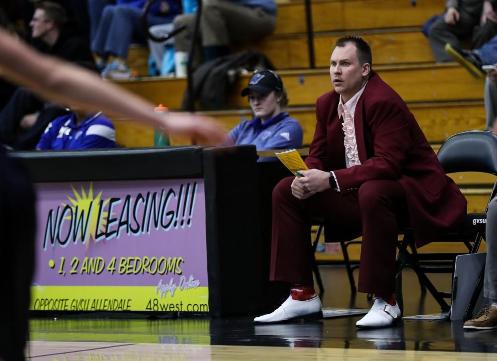 Assistant Head Coach Phil Sayers looks on toward the play during the game vs. Northwood inside the Fieldhouse Arena in Allendale on Thursday, Feb. 9, 2017. 