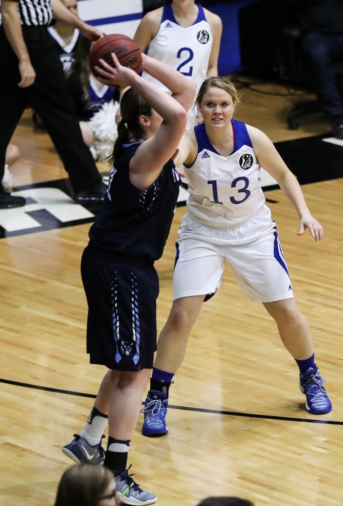 Megan Belke (13) defends Laker territory during the game vs. Northwood inside the Fieldhouse Arena in Allendale on Thursday, Feb. 9, 2017. 